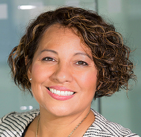 Portrait of Claire Ashford, head of compliance, in the field of financial regulation